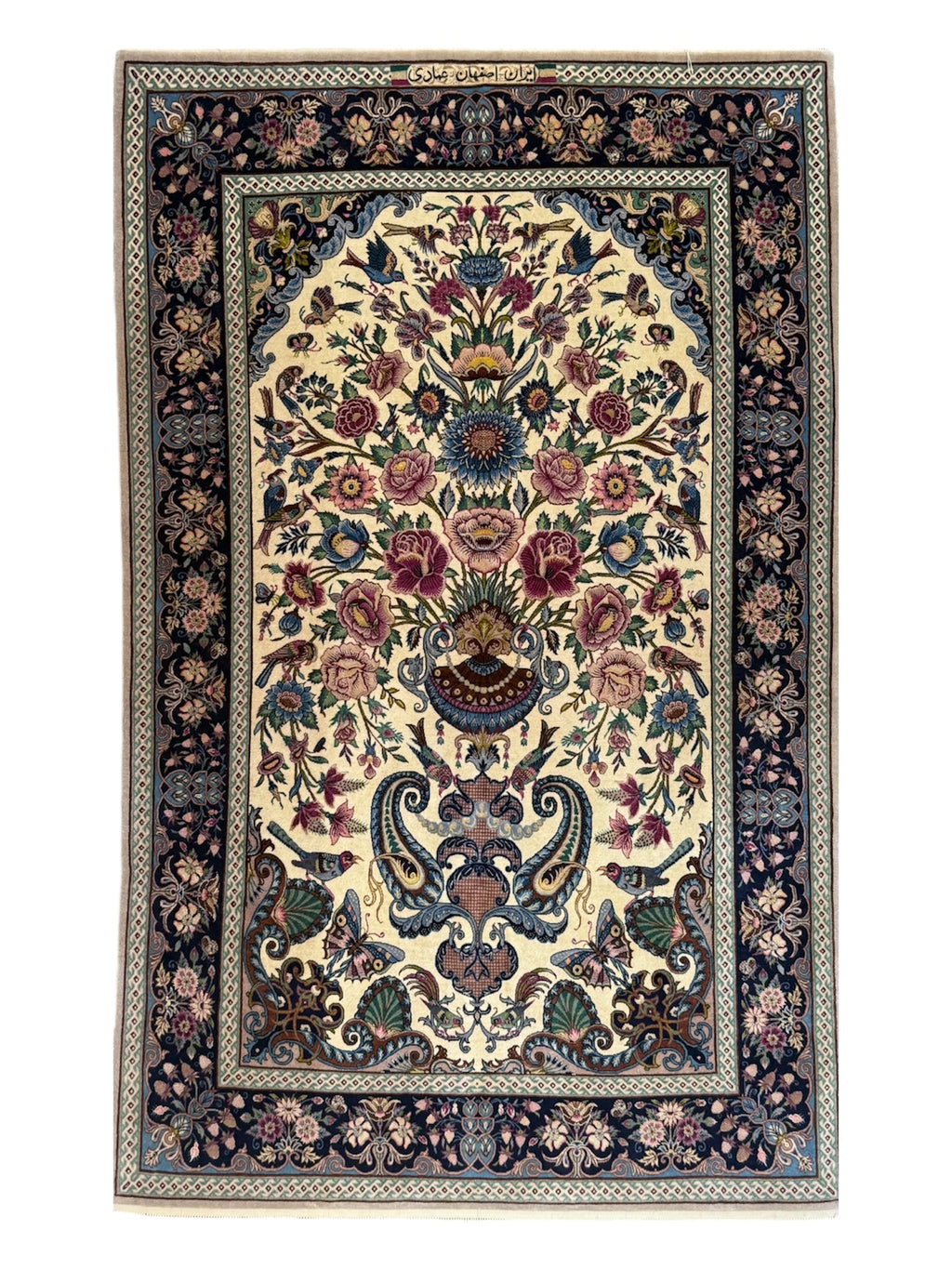 Decorative rug with intricate floral and geometric patterns on a white background