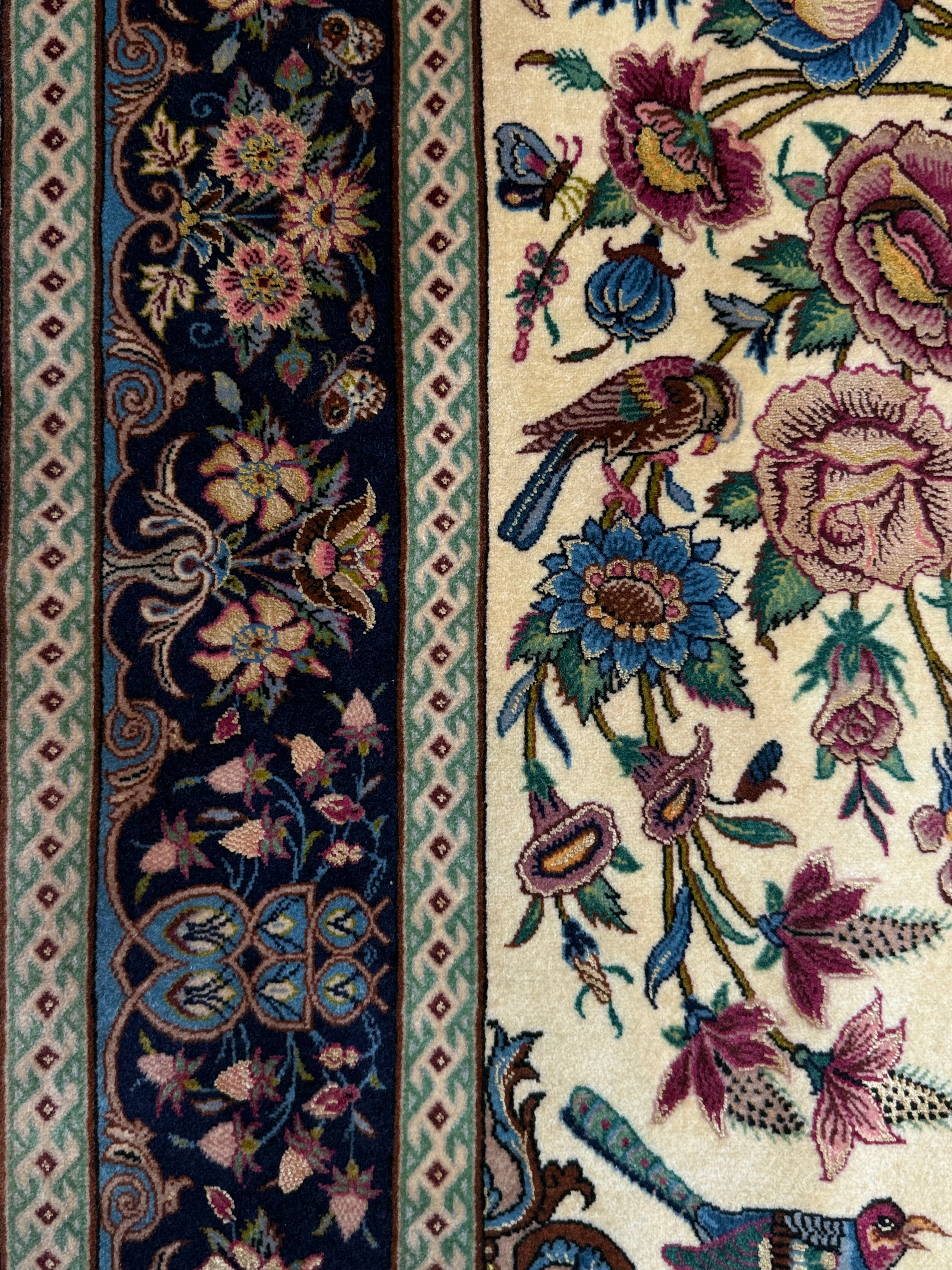 Decorative rug with floral and bird patterns on a beige background