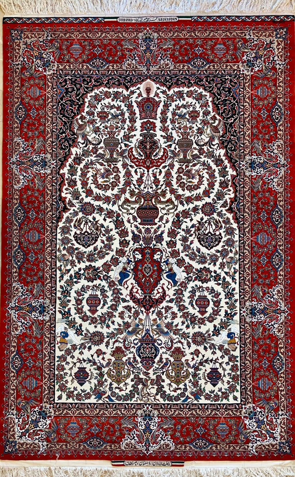 Decorative rug with intricate patterns on a red background