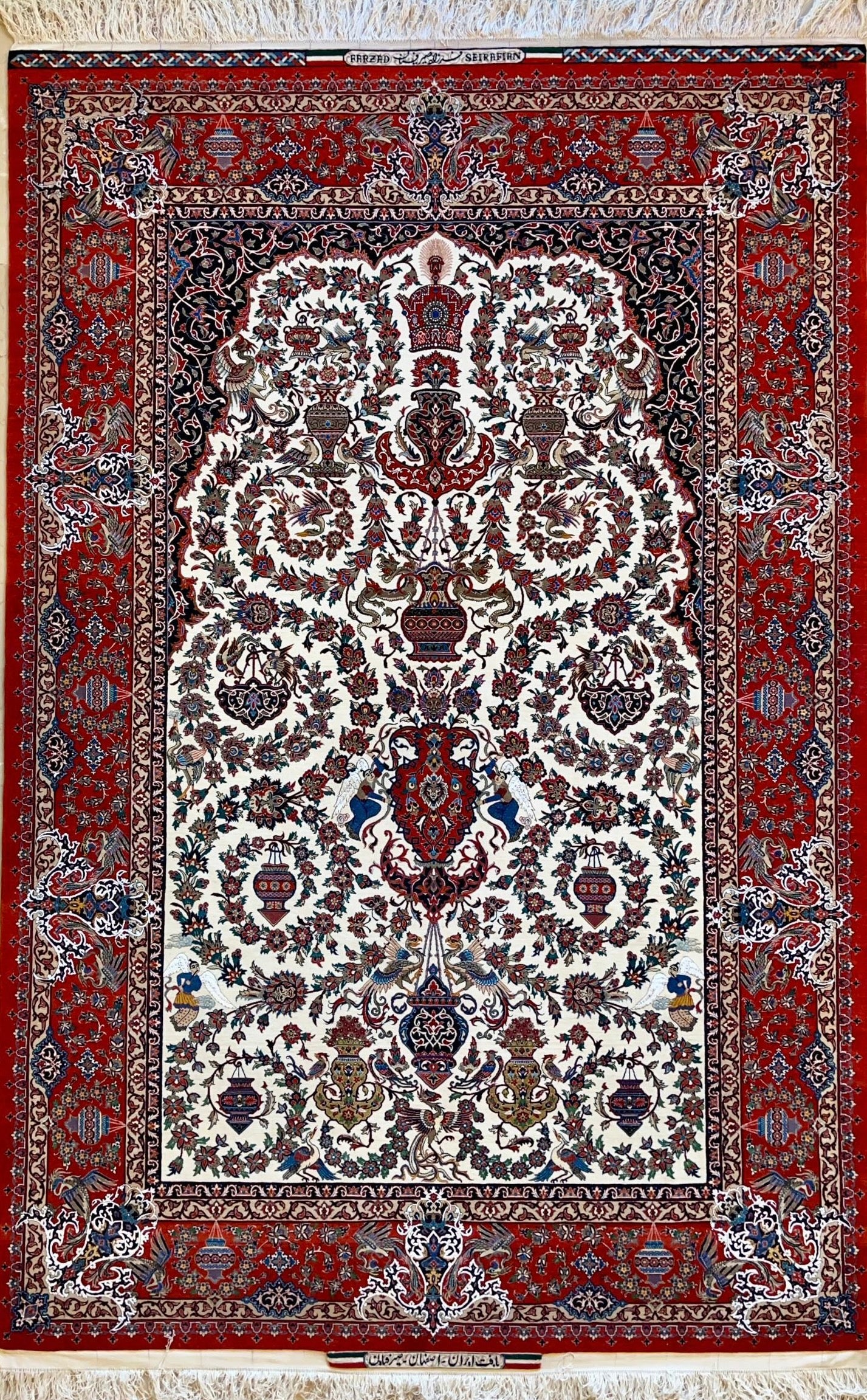 Decorative rug with intricate patterns on a red background