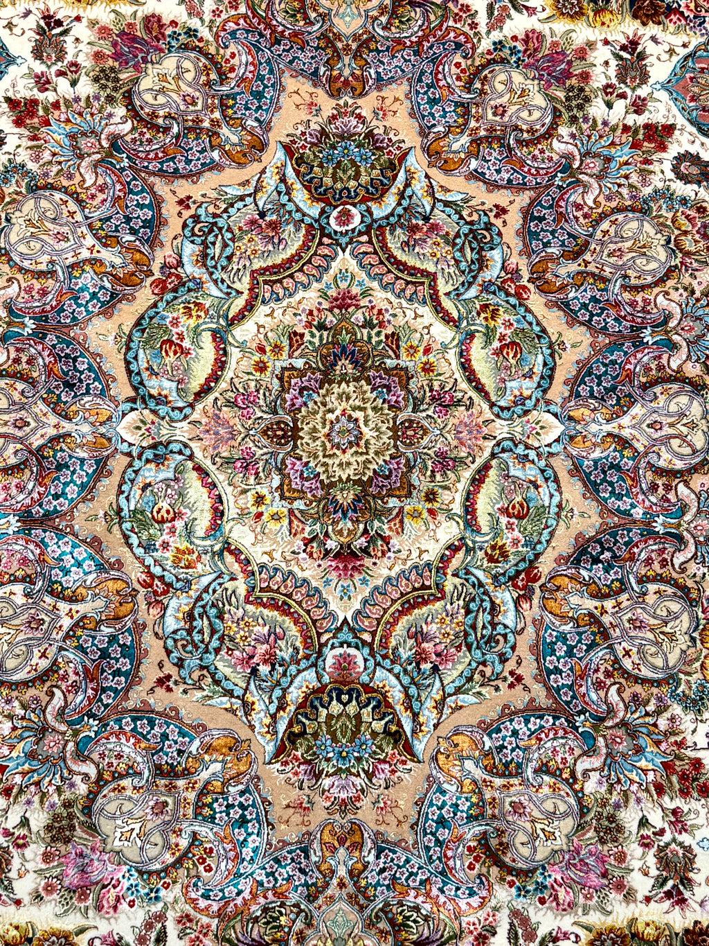 Decorative patterned rug with intricate designs and multicolors