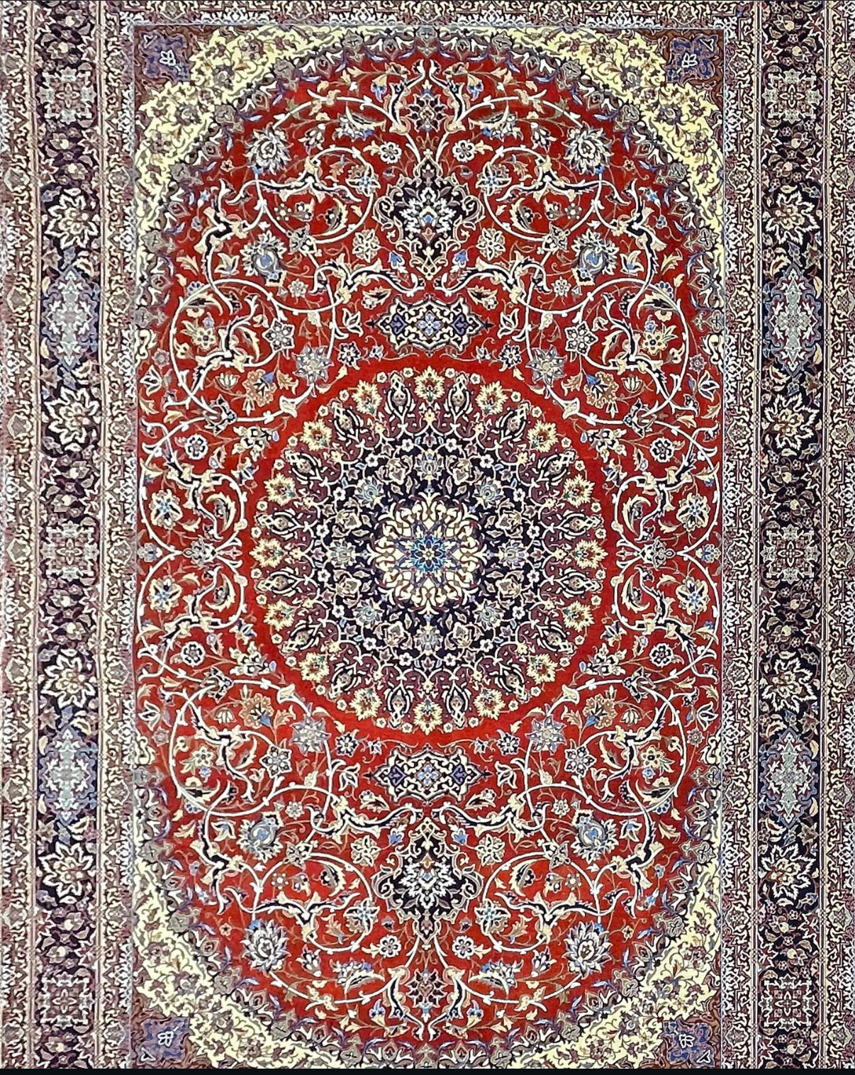 Decorative rug with intricate patterns and a central red circle