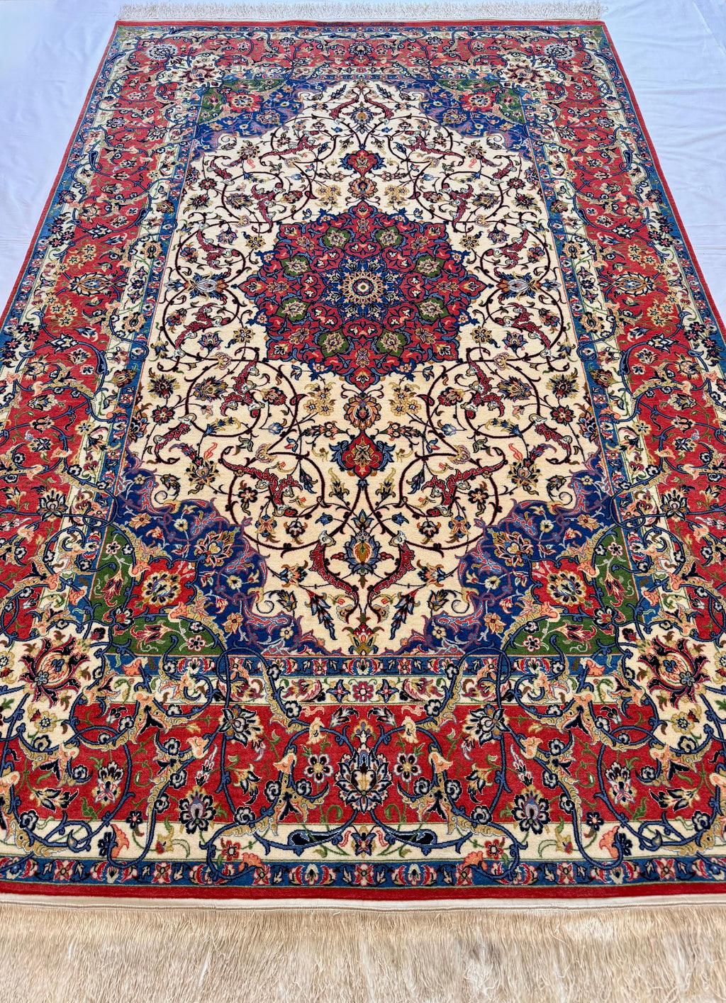 Decorative rug with intricate patterns on a plain background