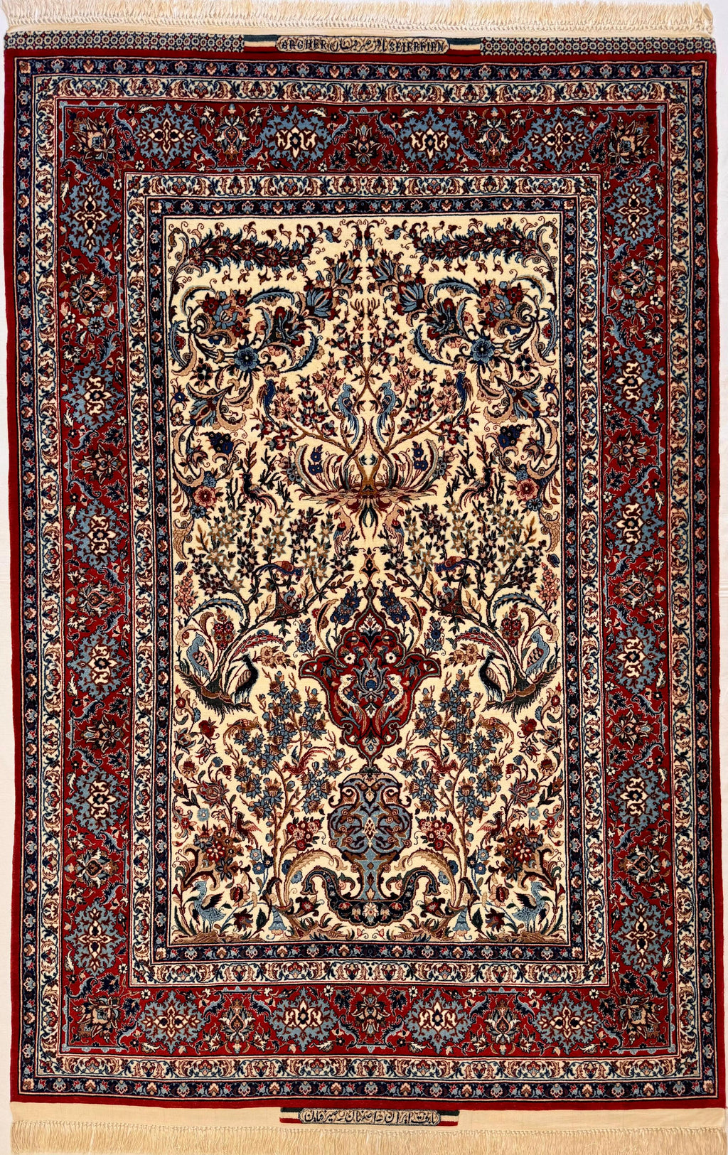 Decorative rug with intricate patterns on a wooden floor