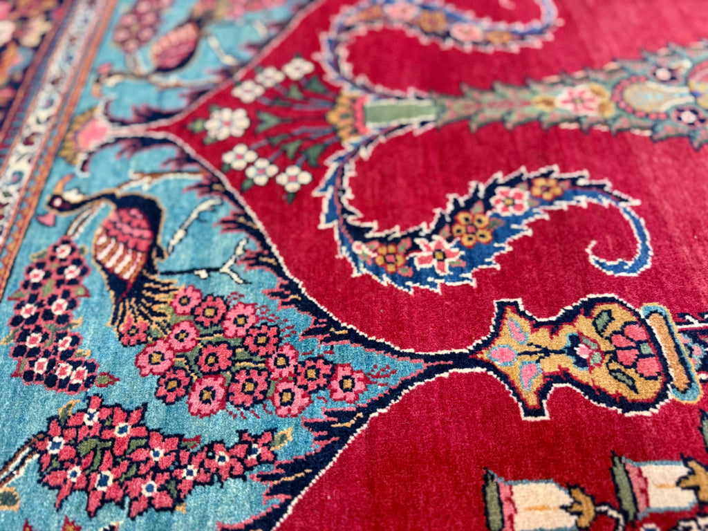 Close-up of a colorful patterned rug with intricate designs.