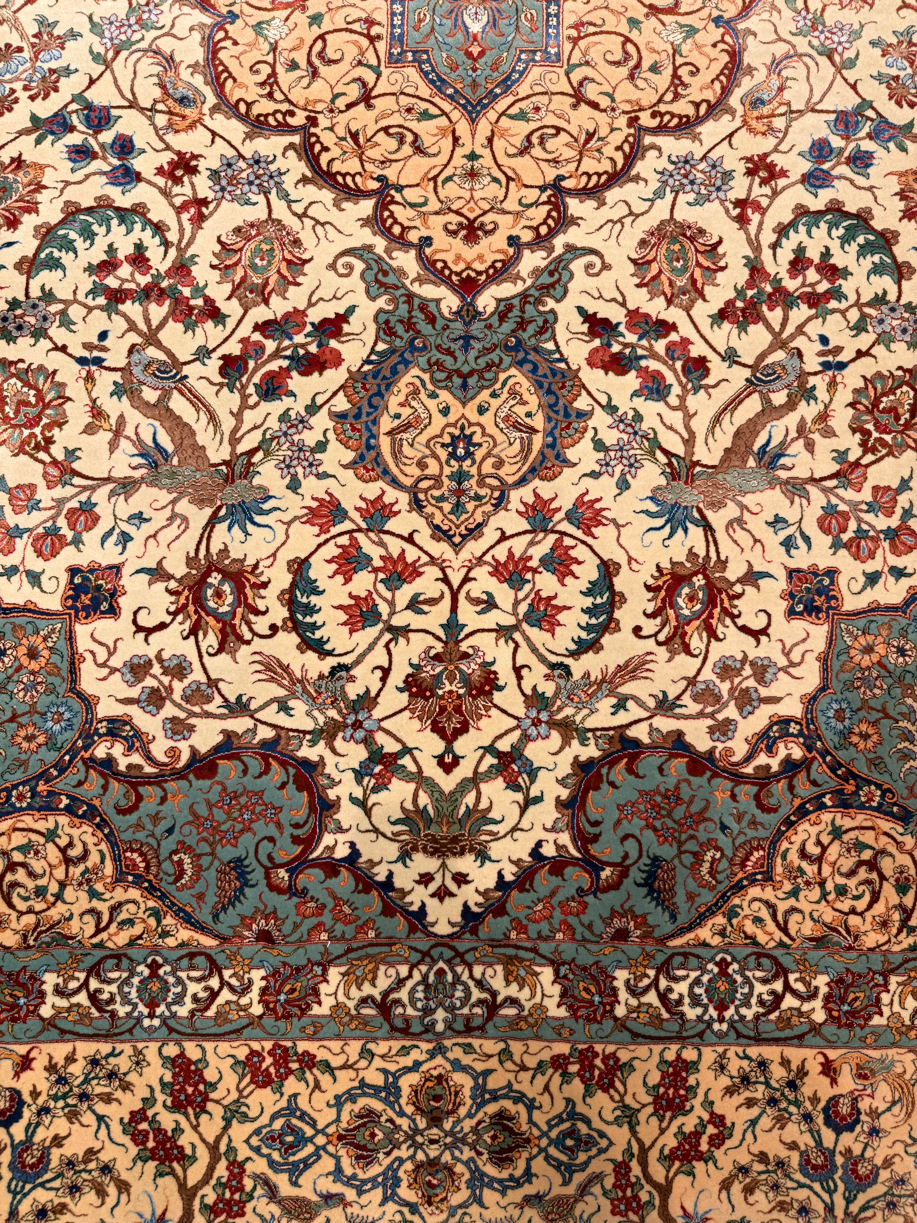 Close-up of a patterned rug with intricate designs.