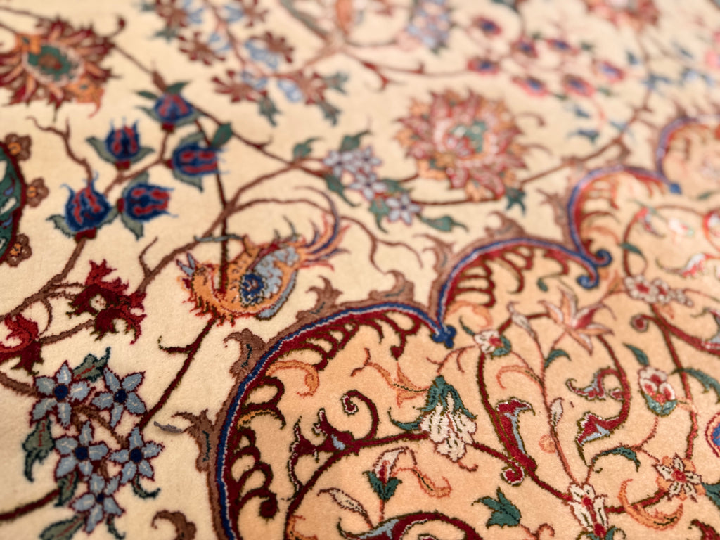 Close-up of a patterned rug with intricate designs.