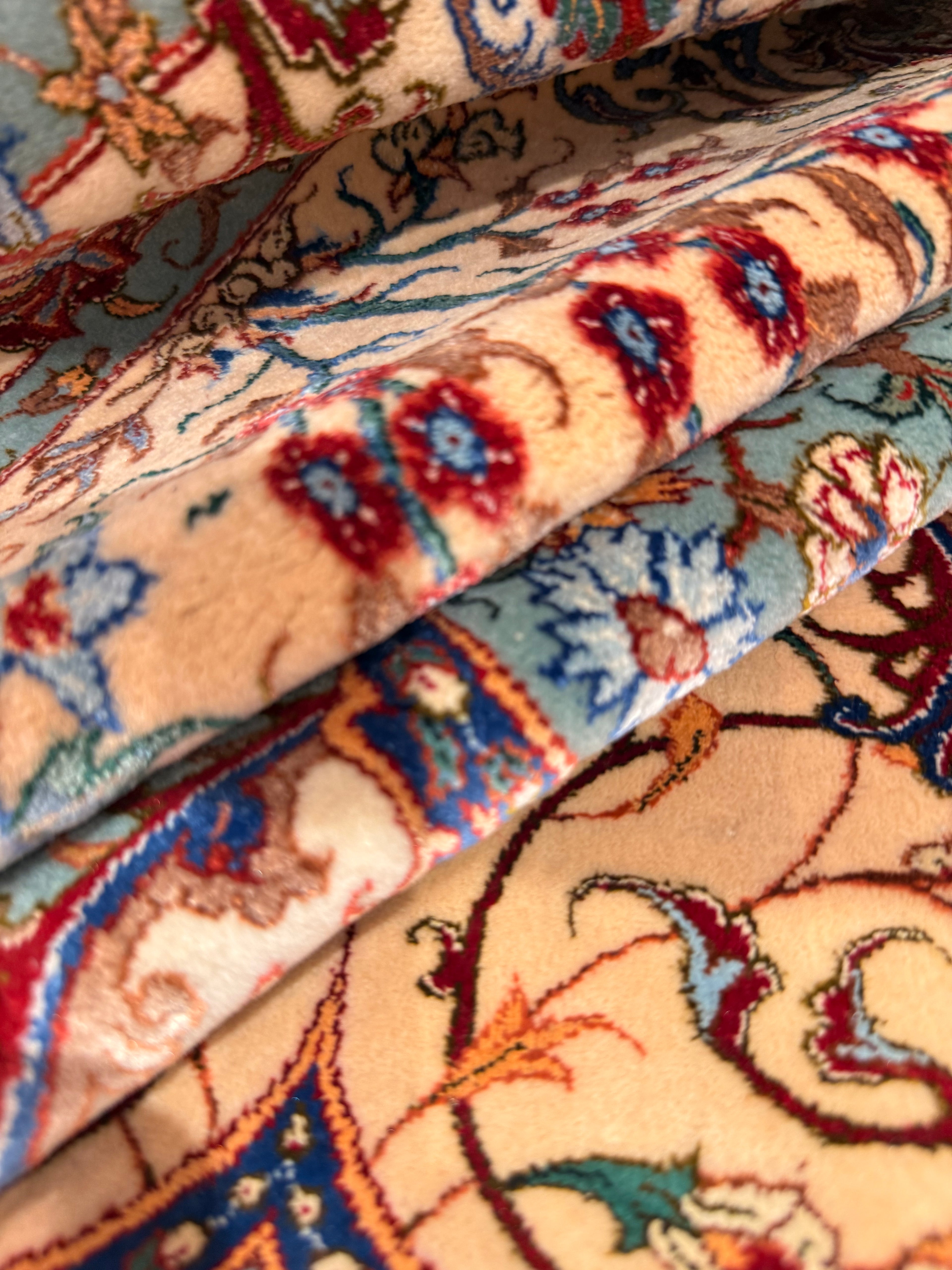 Close-up of patterned rugs with intricate designs.
