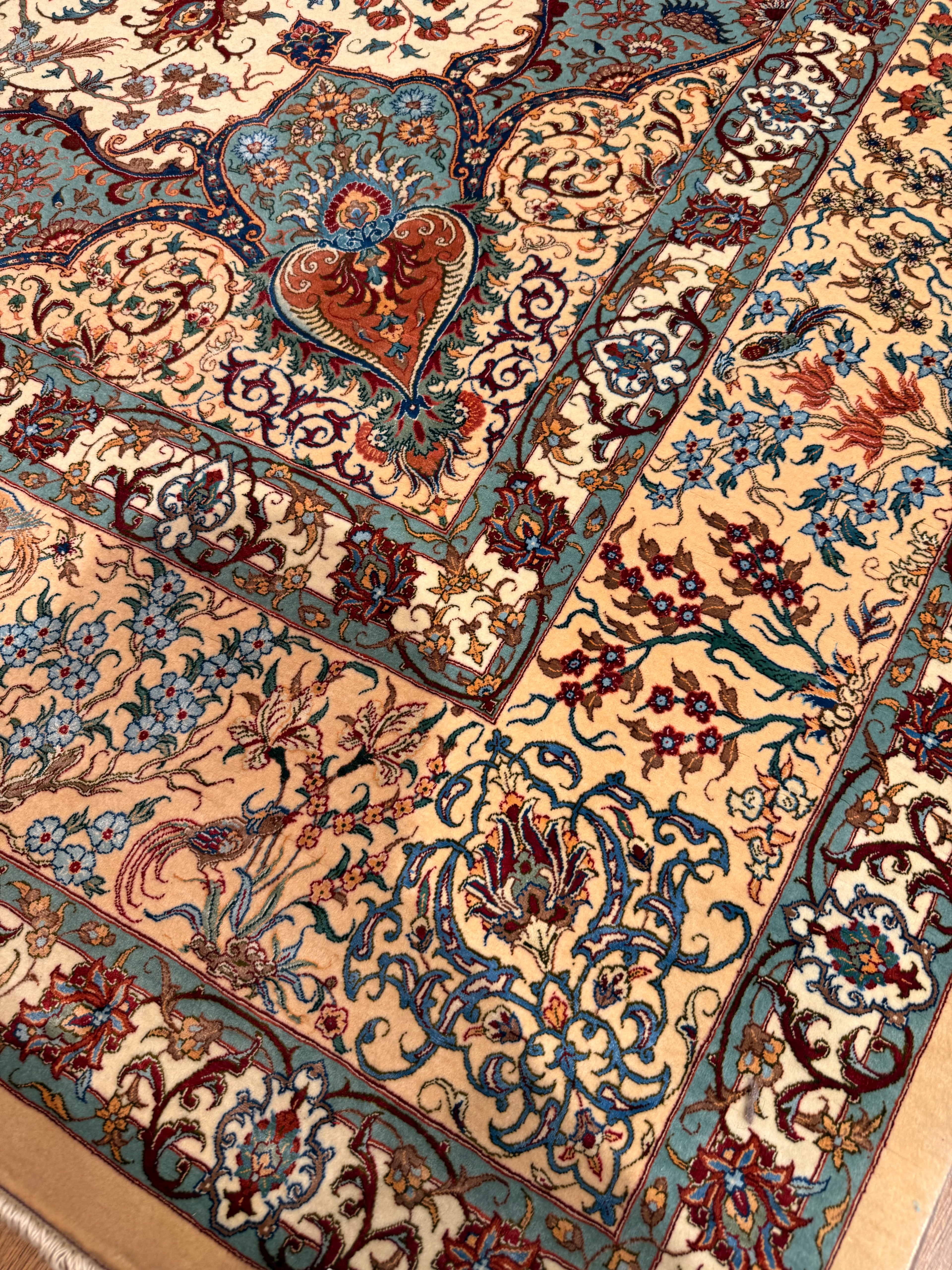 Close-up of a patterned rug with intricate designs.