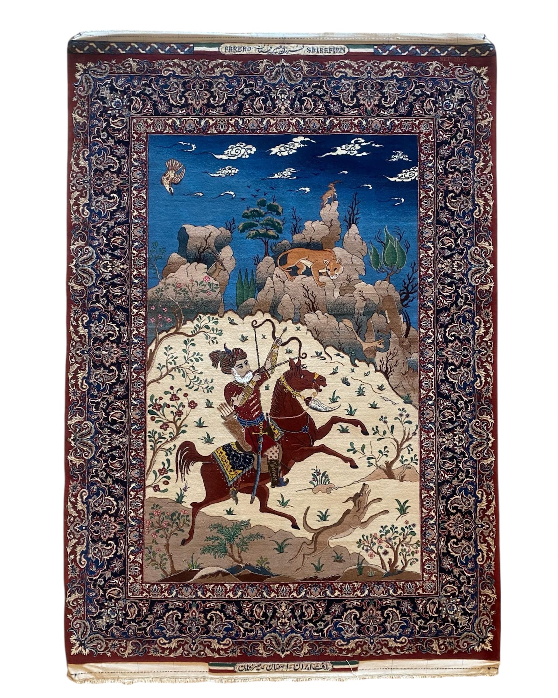 Decorative book cover with intricate design of a warrior on a horse, surrounded by nature elements.