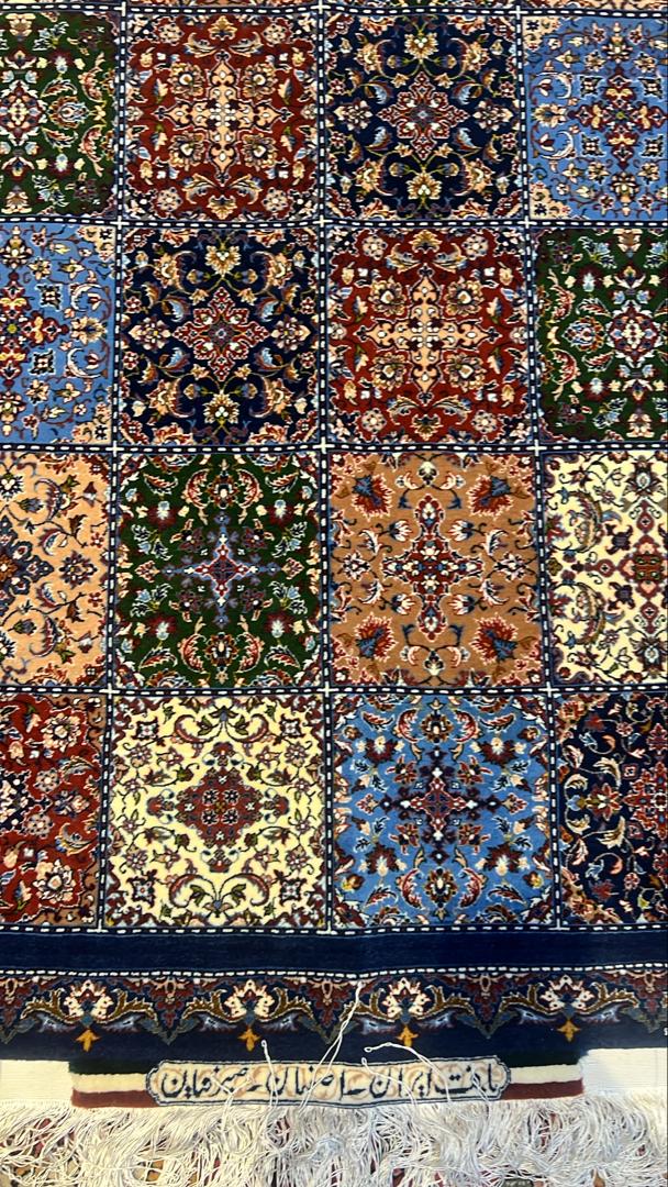 Multicolored patterned fabric with a patchwork design.