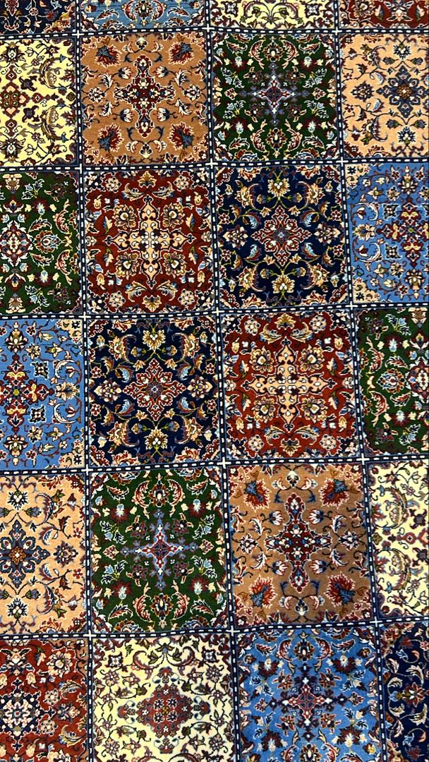 Patchwork of various patterned rugs with a mix of colors.
